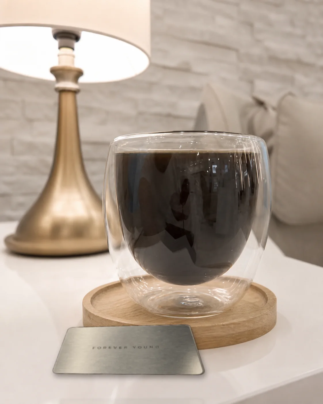 Forever Young gift card beside a cup of coffee